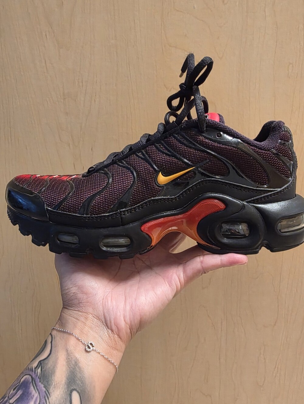 Nike Air Max Plus Black with Red and Yellow Accents